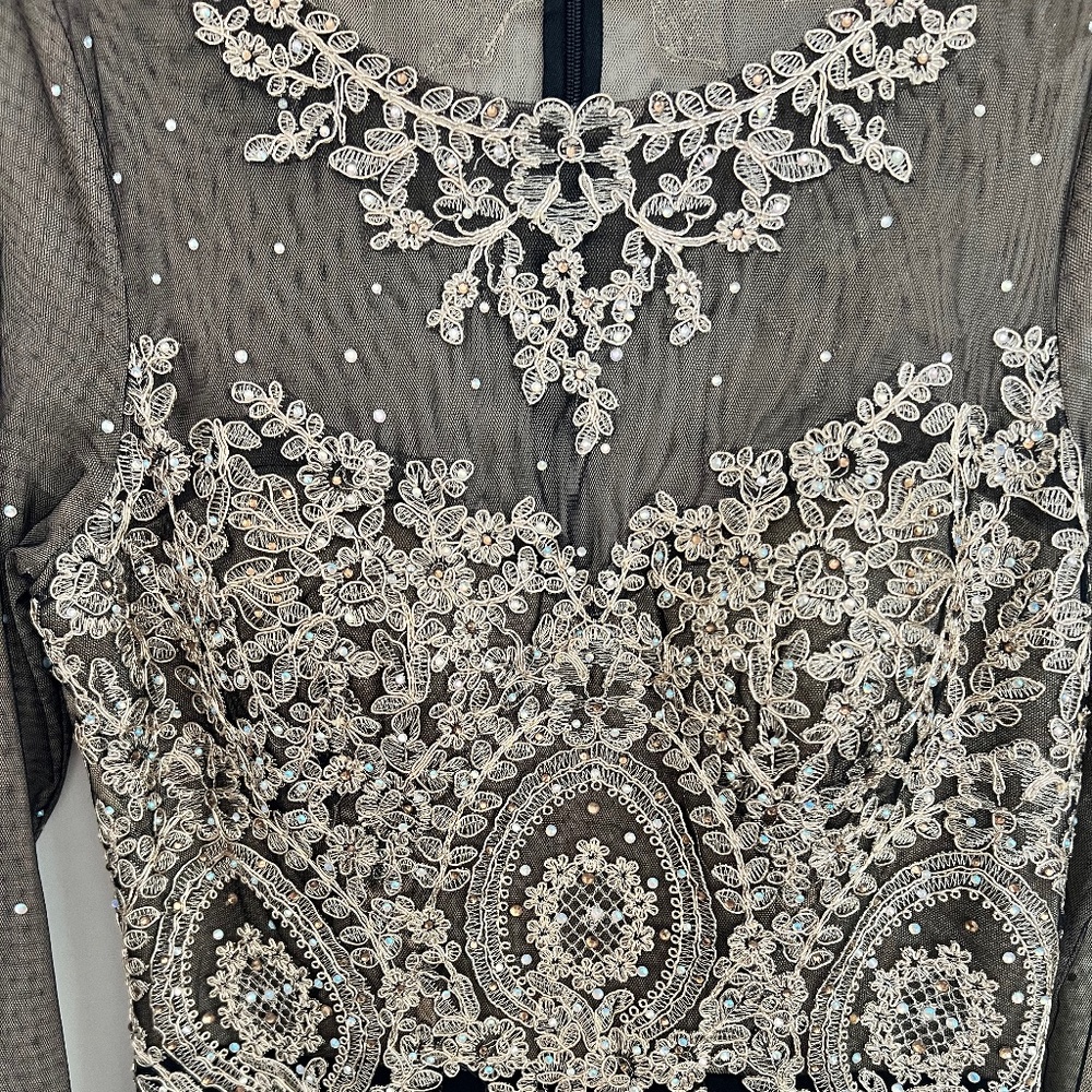 Avery G very beautiful long dress with golden embroidery in front and back.